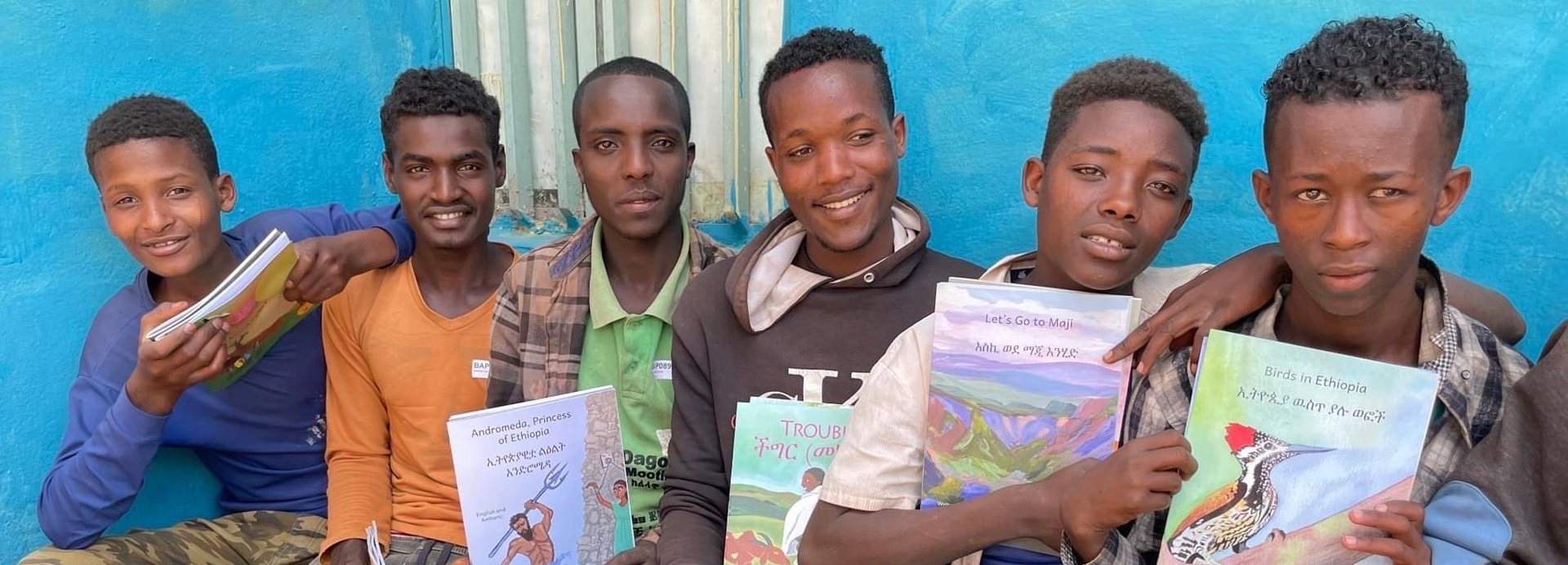 Six boys with books